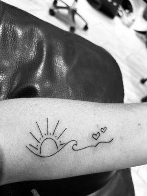 Alex added the sun and hearts to my existing wave. I love it and it means so much more to me because he drew it.