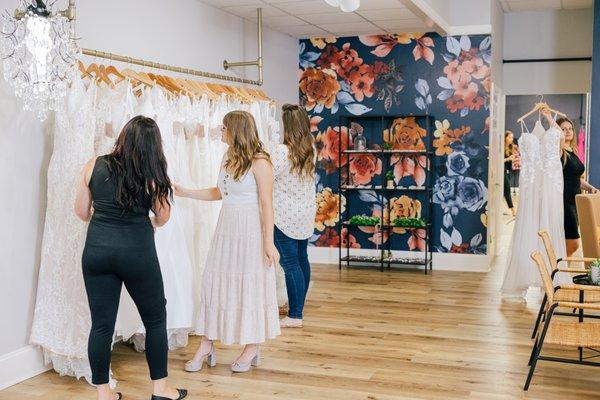 Our clients are always welcome to view and select the gowns that they would like to try on in their private bridal lounge.