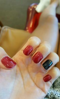 Paint on my cuticles and skin that were not cleaned up. I asked nicely for her to clean it and she asked me where?!