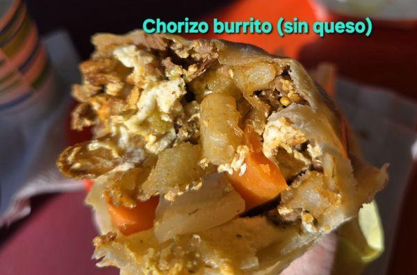 Huevos, chorizo, frijoles, papas, cebollas