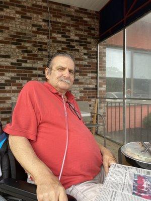 My Dad enjoying the weather on Colony's patio.