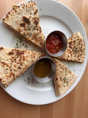 Breakfast quesadilla lovely and tasty recommend the green sauce red was alright but green hit the spot!