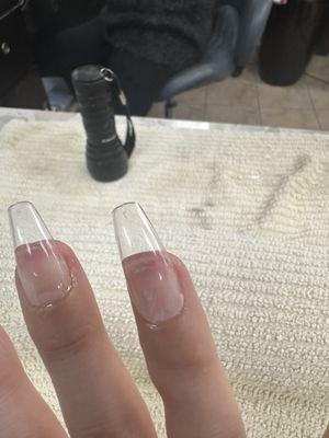 The glue was spewing out of the nail. Such bad quality work.