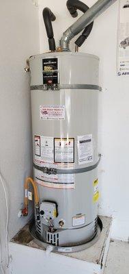 Gas and electric tank style water heater installation