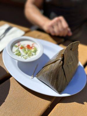 Amok (catfish) lemongrass, kefir, limes, coconut milk, eggs wrapped in a banana leaf. Classic dish. Smooth and not too fishy.