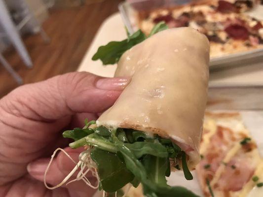 Rolled with provided greens