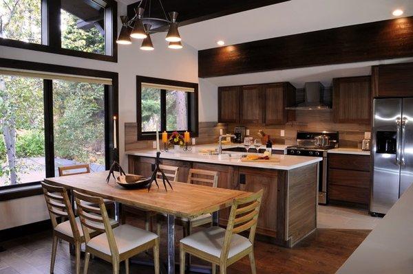 Kitchen remodel and dining set. Walnut cabinetry, reclaimed oak and steel dining set.