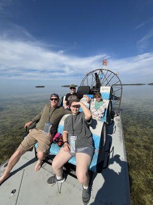 My family and I enjoying the stillness of the shallow reef water