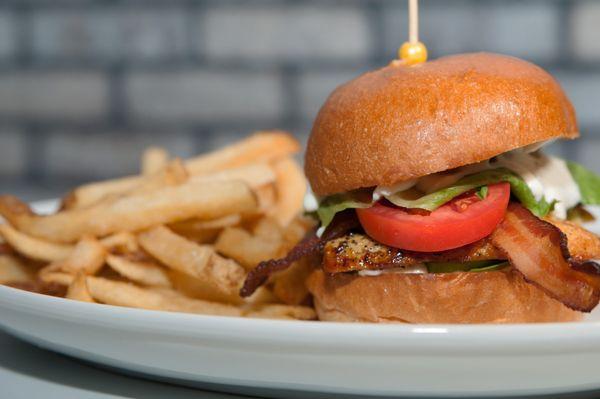 Chicken BLT - marinated grilled chicken, bacon, avocado, lettuce, tomato, garlic aioli, signature bun