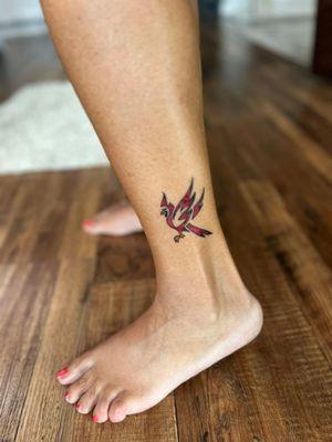 In honor of my grandma who loved cardinals. It was originally applied facing back but Leo suggested it should look forward.