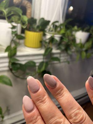 Chipped middle nail. This happened when turned on the water faucet in my sink.