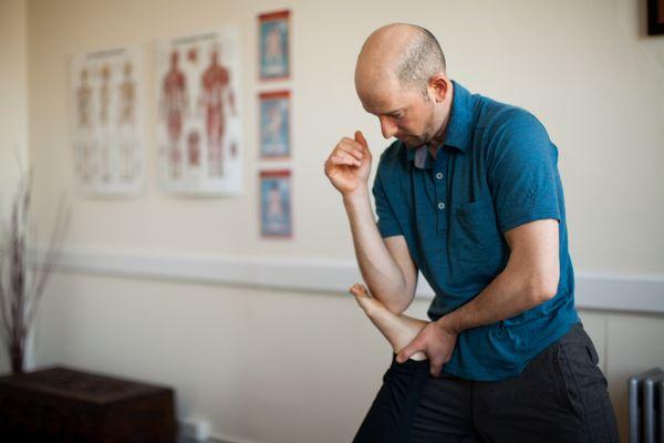 work across the plantar fascia on the back line of the body