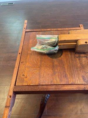 The 2-bags of screws they collected when they disassembled the table!!!!