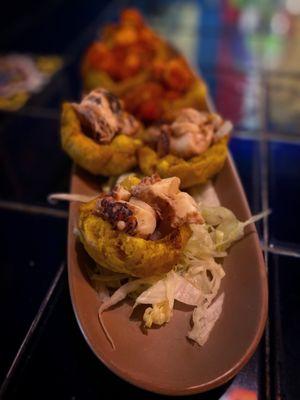 tostones rellenos con pulpo, which is fried plantain cups stuffed with octopus