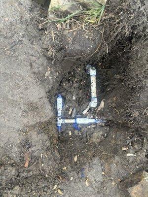 Detail of mainline repairs under pecan tree