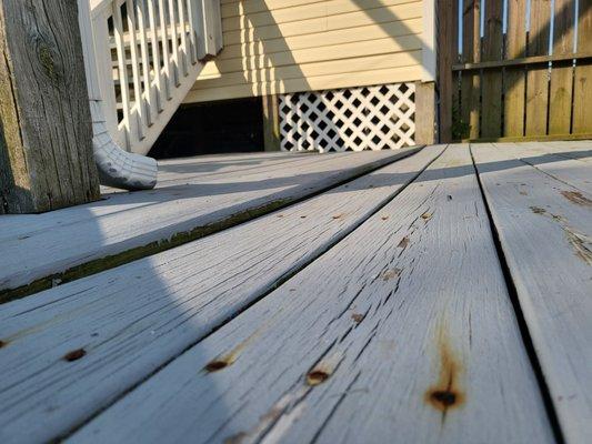 This old deck tripped every one of our guests as we tried to enjoy the pool.