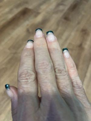 Love Jackie's latest art. I sort of described what I wanted and she came up with this gorgeous festive French manicure. Awesome.