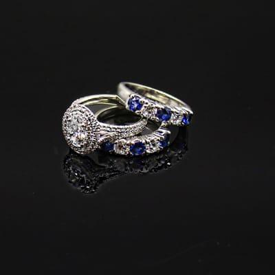 Norman Silverman Engagment ring with diamond and sapphire wedding bands