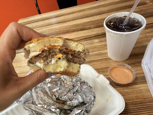 Mr. Beast burger with classic sauce on the side and Fuze tea. The burger is mostly devoured. So excited I forgot to take a full before pic!