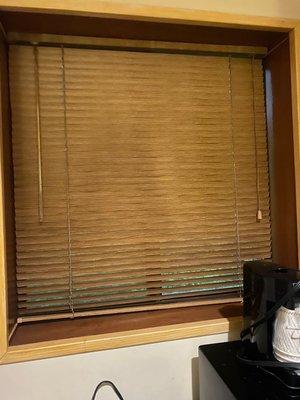 Open window with people doing drugs right outside the window