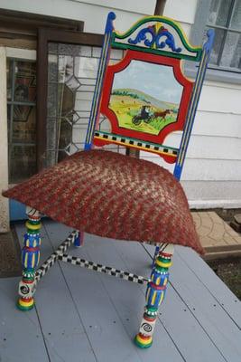 Hand-painted chairs by a local artist.
