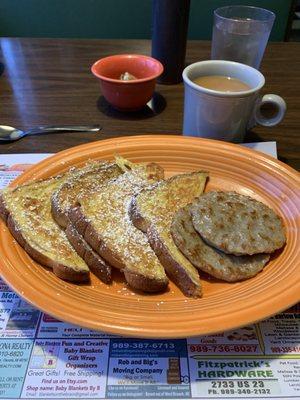 Tasty French toast and sausage patties cooked to perfection