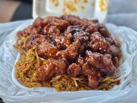 Orange chicken, fried rice, and noodles
