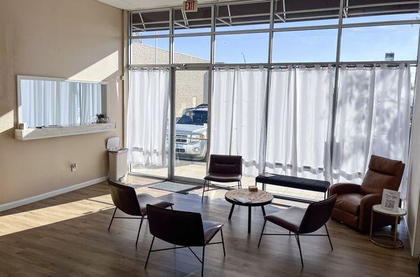 Clinic waiting area showing the front desk and patient seating.