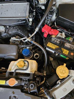 Oil all over my engine bay bec they left the cap off!