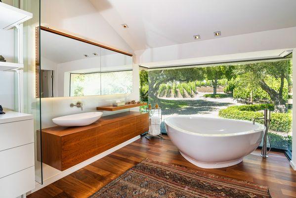 Modern bathroom with views of the vineyard at Alisal.