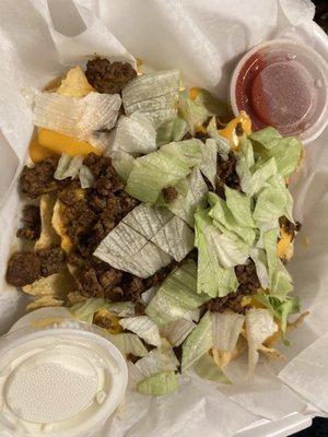 Mini nachos- minus the tomatoes because I'm allergic. The nachos were layered with ground beef, lettuce, and melted cheese. Delicious