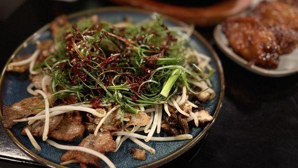 Pork belly with green onion salad