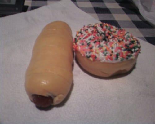 Large sausage kolache and yeast donut with sprinkles...yum!