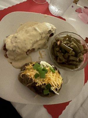 Chicken cordon bleu with baked potato and green beans