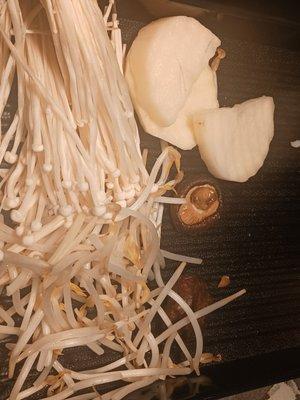 Slices of Cut Potatoes, Enoki Mushrooms and Bean Sporoutto Add to Hop Pot Broth