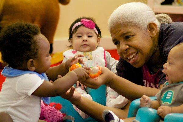Teachers in our infant room nurture each child individually and enhance learning through singing, reading, talking and play.