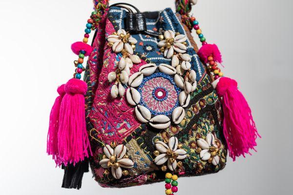 The bucket bag
Available for purchase $80
Dimension height:10", length: 7", width:4",strap:42"