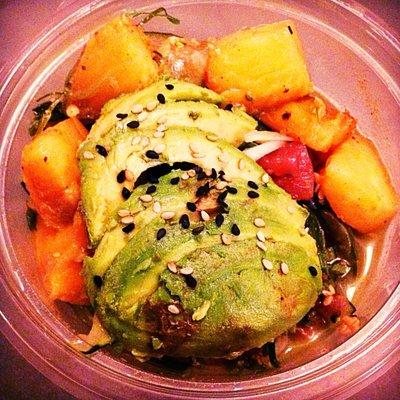 Ahi tuna over seaweed salad base and avocado, charred pineapple, and Jalapeño add ons (size: small, AKA Lil Daddy Poke)