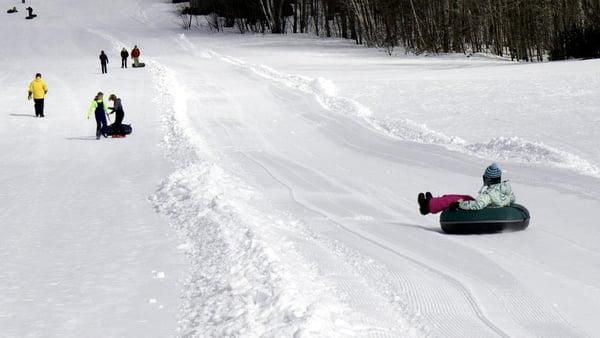 Spring Carnival 2014 included FREE snow-tubing for all willing to hike Little Joe.