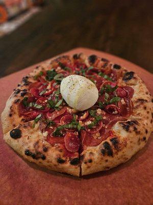 Peperoni burrata bizzawith hot honey and sub creamy pesto sauce