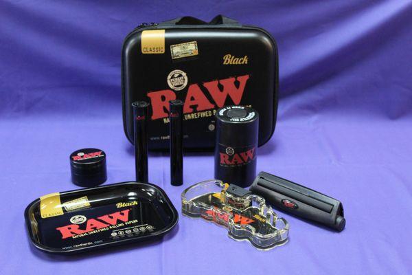 RAW travel kit, that comes with a tray, grinder, airtight holder, ashtray, rolling tool, and roll holders