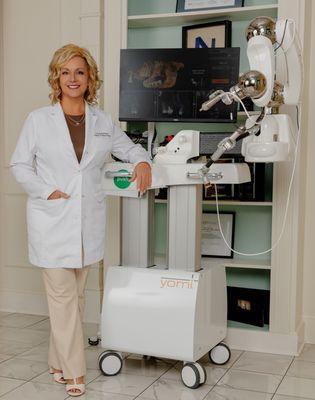 Dr. Leslie & our YOMI Robot! The only robotic surgical system in the field of dentistry. For precise guided dental implant placements!