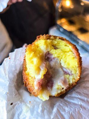 A ham and cheese arancina rice ball