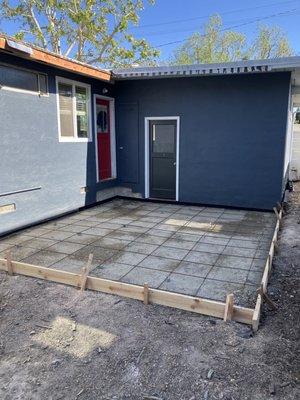 with compacted gravel base and rebar