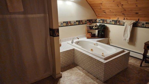 Jacuzzi tub in barn loft