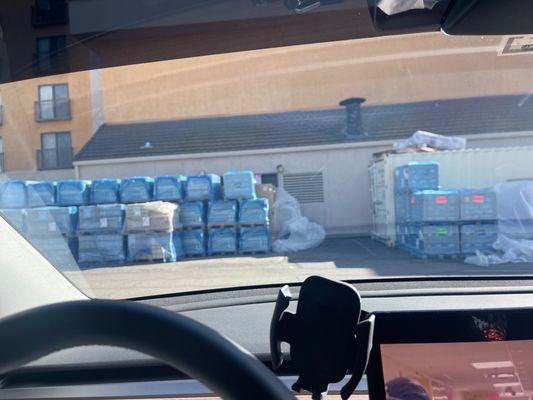 Pallets in front of the chargers. Hard to back up into the spot.