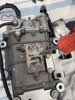 Yamaha fuel cooler plugged up with calcium & salt. Another successful repair.