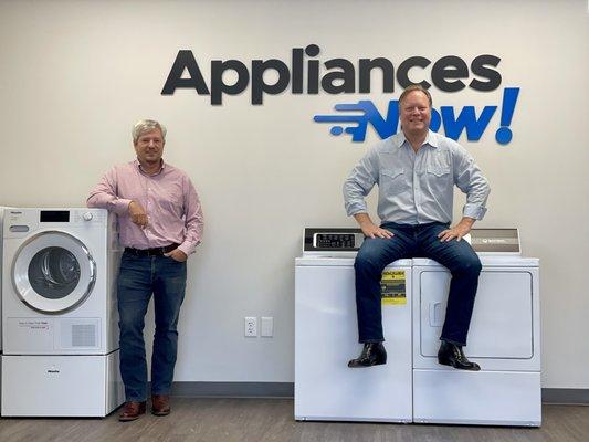 Our owners inside of our showroom