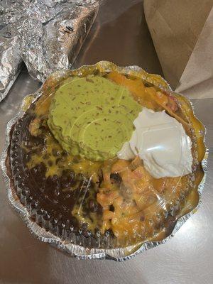 22. Guacamole Nachos with added 52. Sour Cream