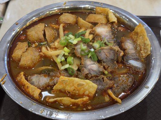 LiuZhou river snail rice noodle (w. soup) - added crispy roast pork and tofu puff